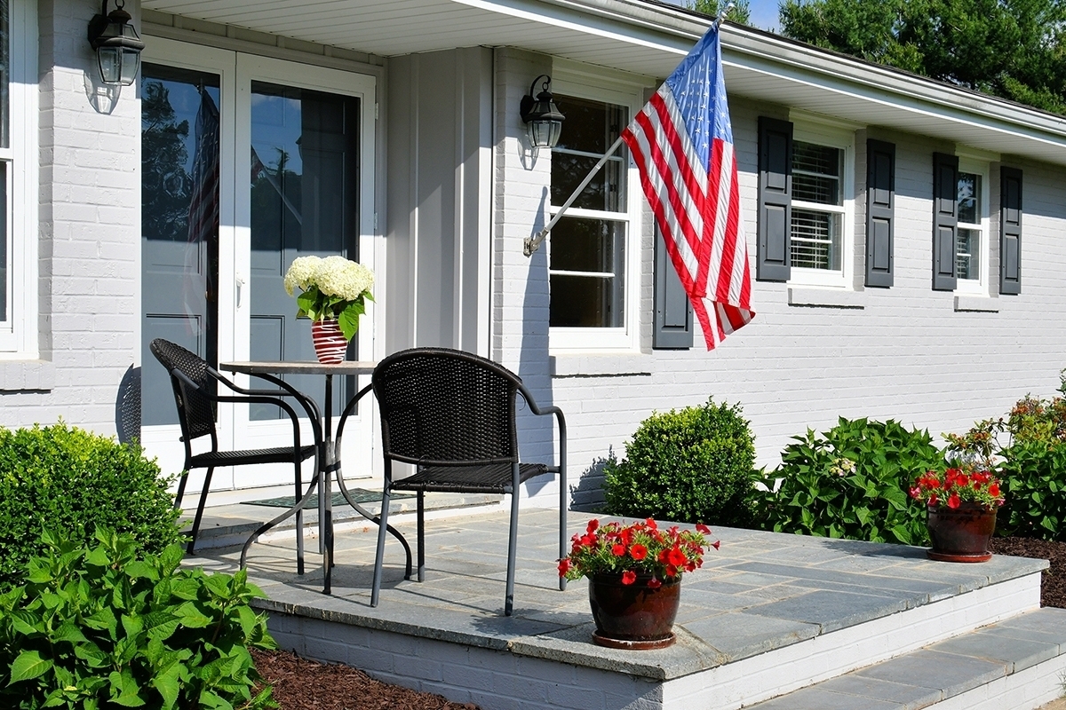 Outdoor living space home sweet home front porch with a bistro table seating area white hydrangea t20 g Rz Xaz 1